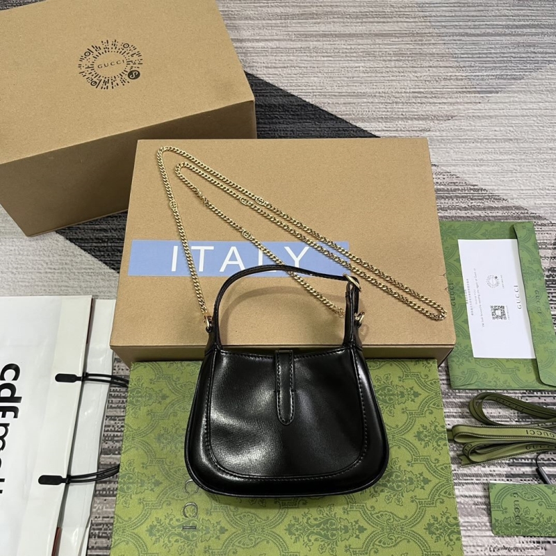 G*u*i top handle bags